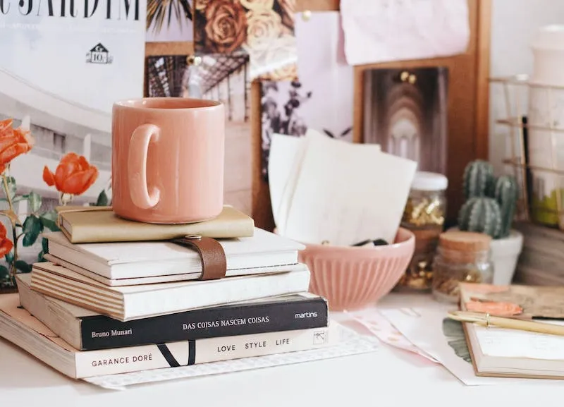 A cluster of objects piled up on a desk