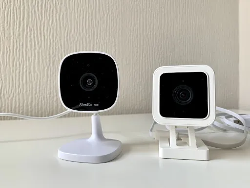 AlfredCam next to Wyze Cam V3