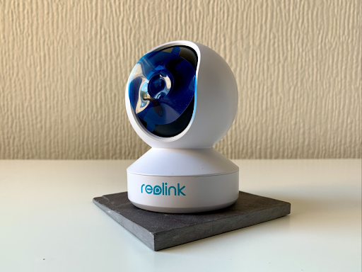 Reolink E1 Pro with blue film covering the lens.