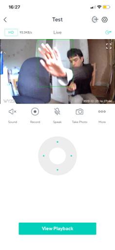 Wyze app live view with motion tracking outlining a person’s raised hand