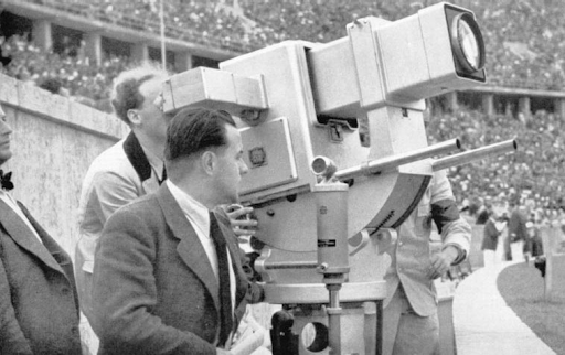 Walter Bruch operating his Olympia-Kanone camera at the Berlin Olympics, 1936.