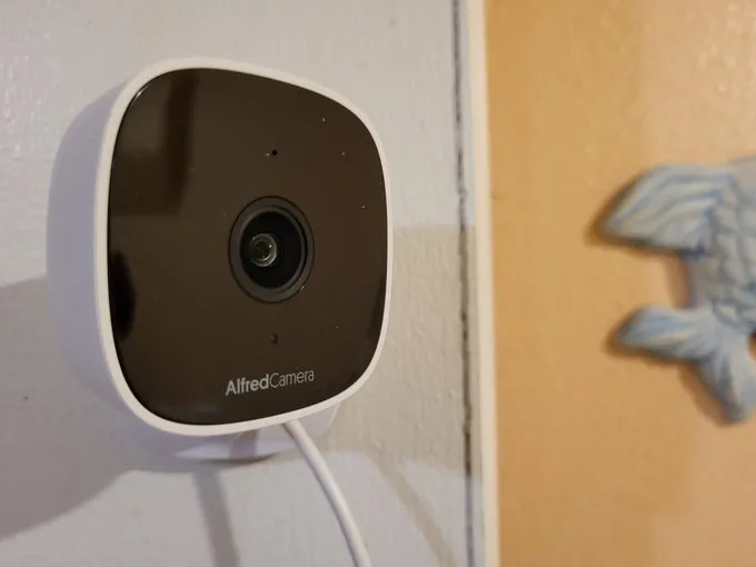 An AlfredCam mounted on a wall