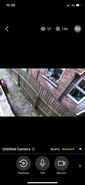 AlfredCam Plus live view of a backyard