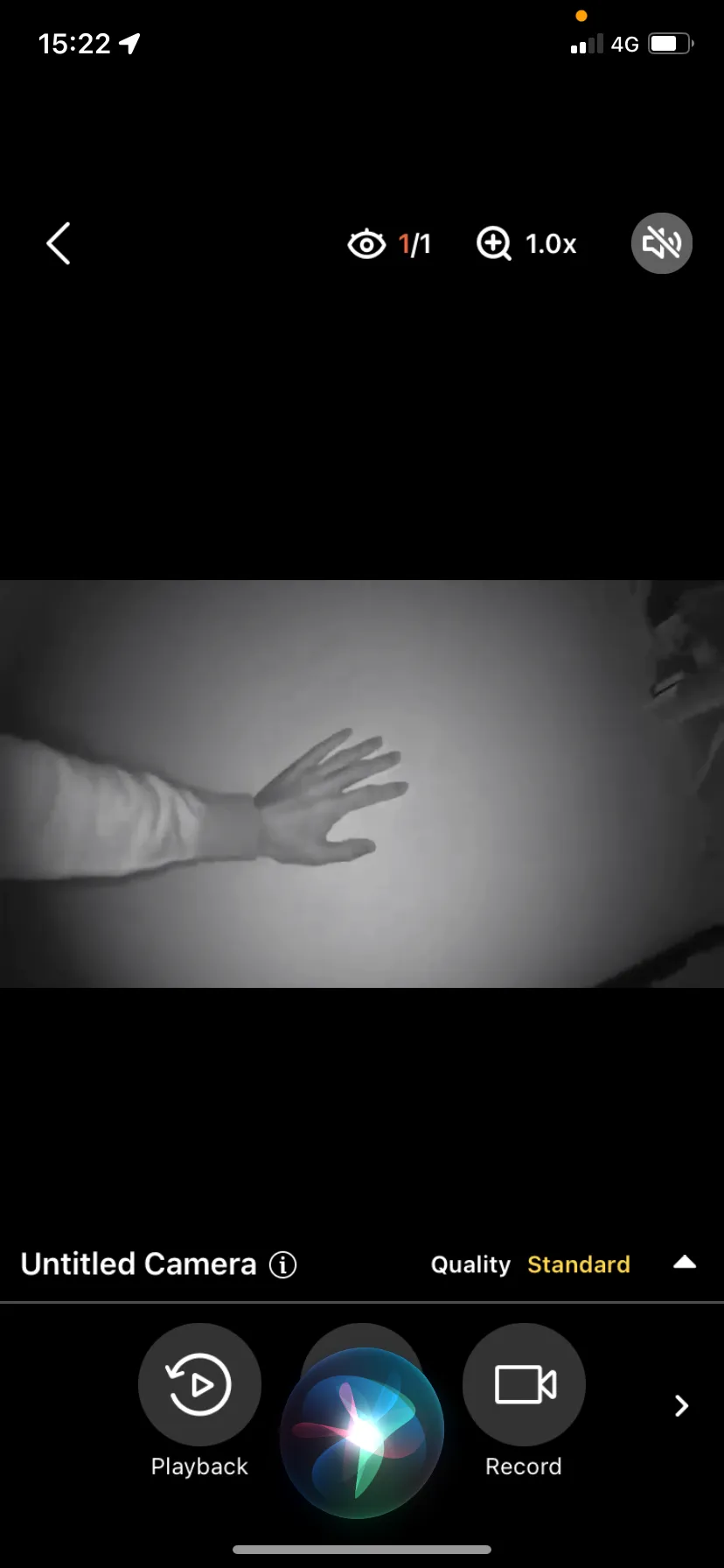 AlfredCam Plus captured footage (a man's hand) via night vision.